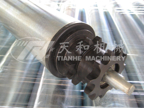 Double sprocket friction stacking laying roller